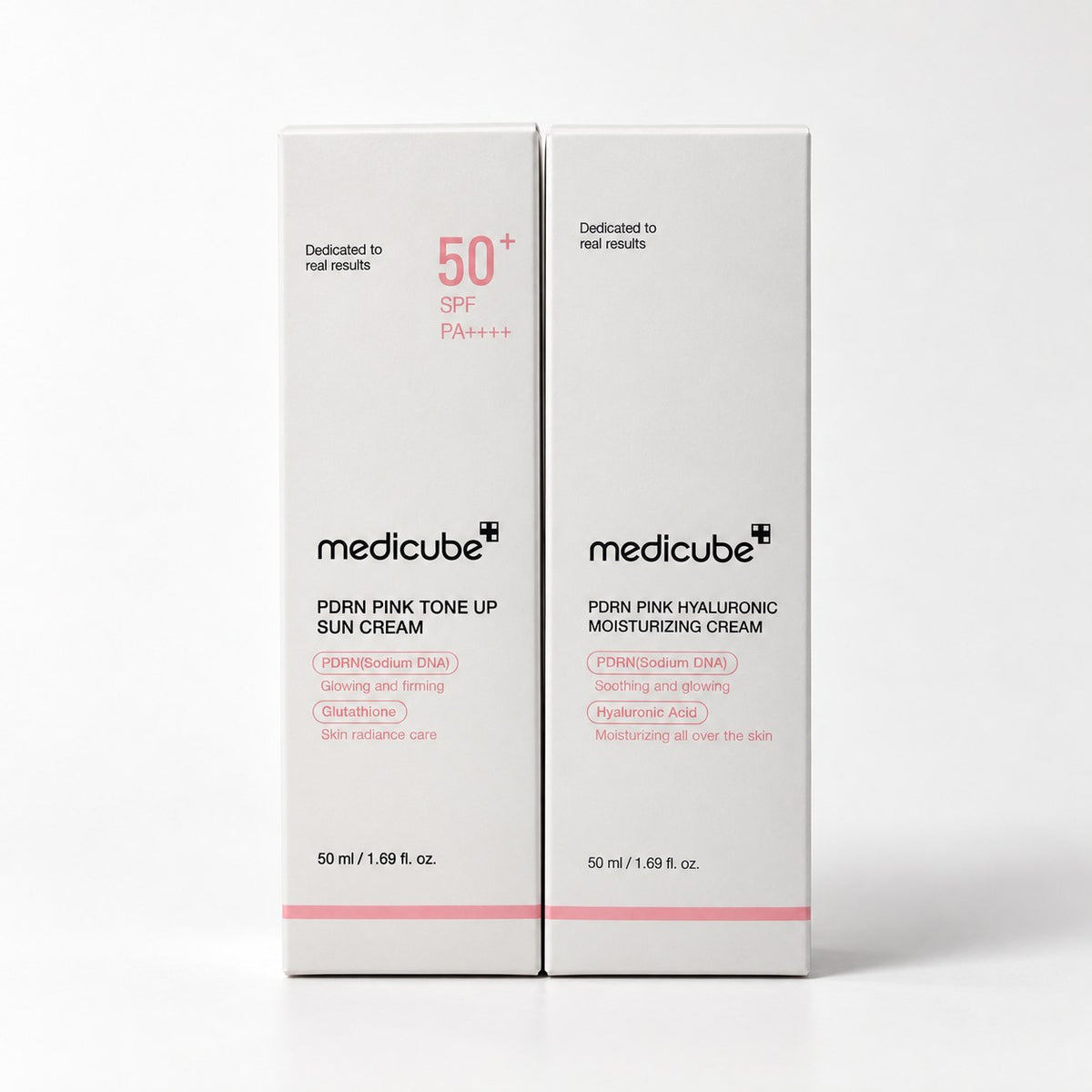 Pack Medicube : PDRN Pink Tone Up Sun Cream SPF50+ et PDRN Pink Hyaluronic Moisturizing Cream sur fond blanc