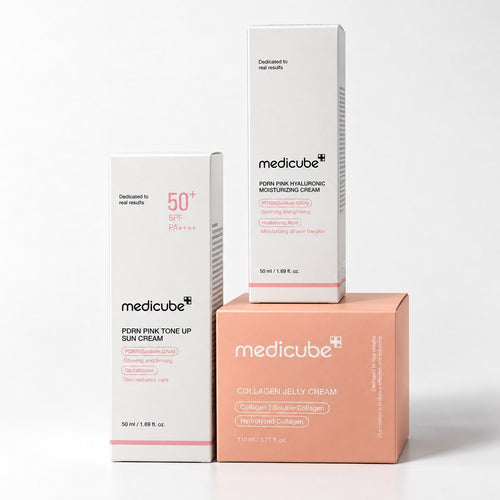 Pack Medicube : PDRN Pink Tone Up Sun Cream, PDRN Pink Hyaluronic Cream et Collagen Jelly Cream sur fond blanc